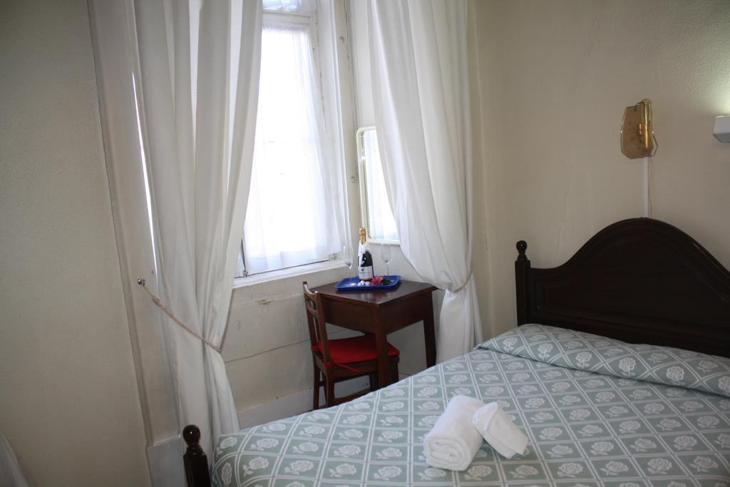 Pensao Residencial Estrela Do Mondego Hotel ลิสบอน ห้อง รูปภาพ