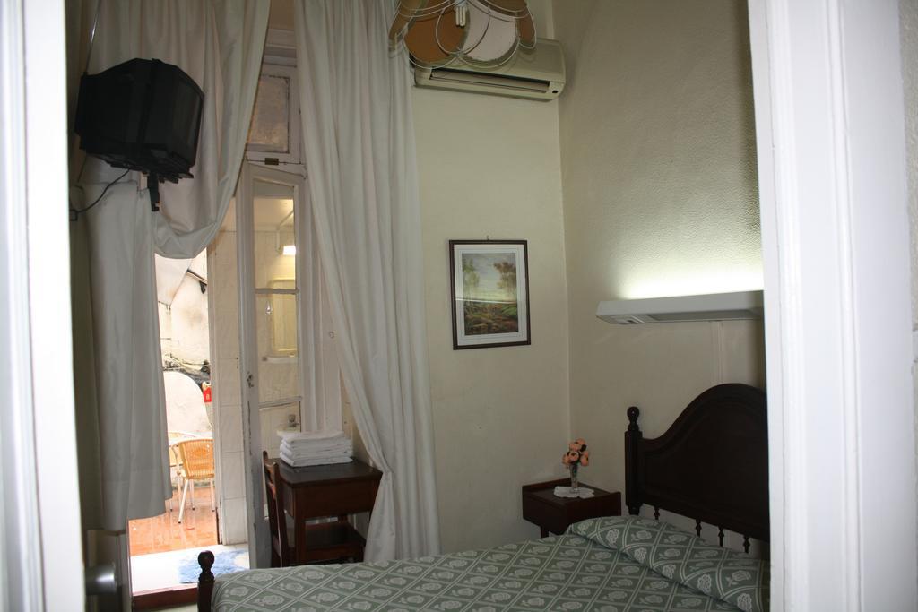 Pensao Residencial Estrela Do Mondego Hotel ลิสบอน ห้อง รูปภาพ